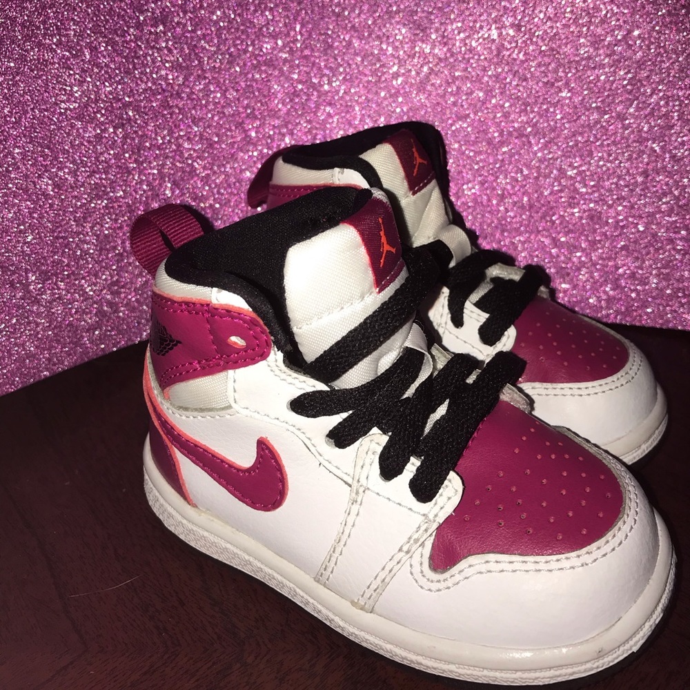 Kids pink and white Nike’s